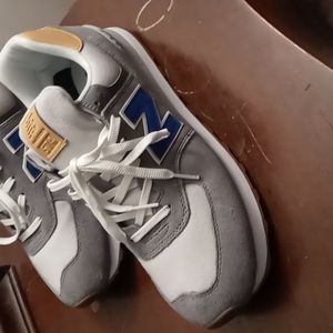 New balance 574 sneakers. Blue gray and some tan